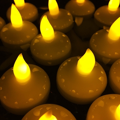 Satz von 12 flackernder geführter Kerze hellgelbes Tealight mit Batterie-Ersatz